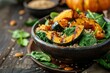 Quinoa salad with grilled pumpkin fresh spinach on rustic wooden table Superfood concept Focus on food
