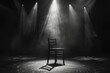 © LimeSky - A lone wooden chair on a stage lit by soffits in black and white