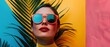 Stylish and confident woman wearing red sunglasses and red lipstick, set against tropical palm leaves background. Colors trendy accessories convey a sense of summertime vibrancy, carefree spirit.