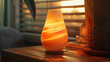 A lamp that gives off a warm and gentle light, similar to the colors of a sunset
