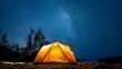 A single tent illuminated from within, under a starry sky