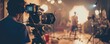 Behind the scenes of movie shooting or video production with camera equipment on film set