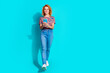 Full length portrait of nice lady walk use smart phone wear t-shirt isolated on teal color background