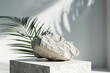 Textured rock on a pedestal with a palm leaf shadow creating a minimalist aesthetic. Minimalist Display of Textured Rock