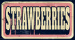 Aged and retro strawberries sign on wood