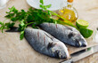 ideal ingredients for cooking dorado fish are lime juice, olive oil, salt, parsley for decoration