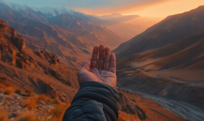 Wall Mural - A person reaching out to the sky with their hand.