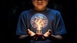 © Damerfie - A child's hands reveal a light bulb in a brain shape, picturing the nurturing of young intellect