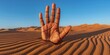 A hand sticking out of the sand in a desert. Generative AI.