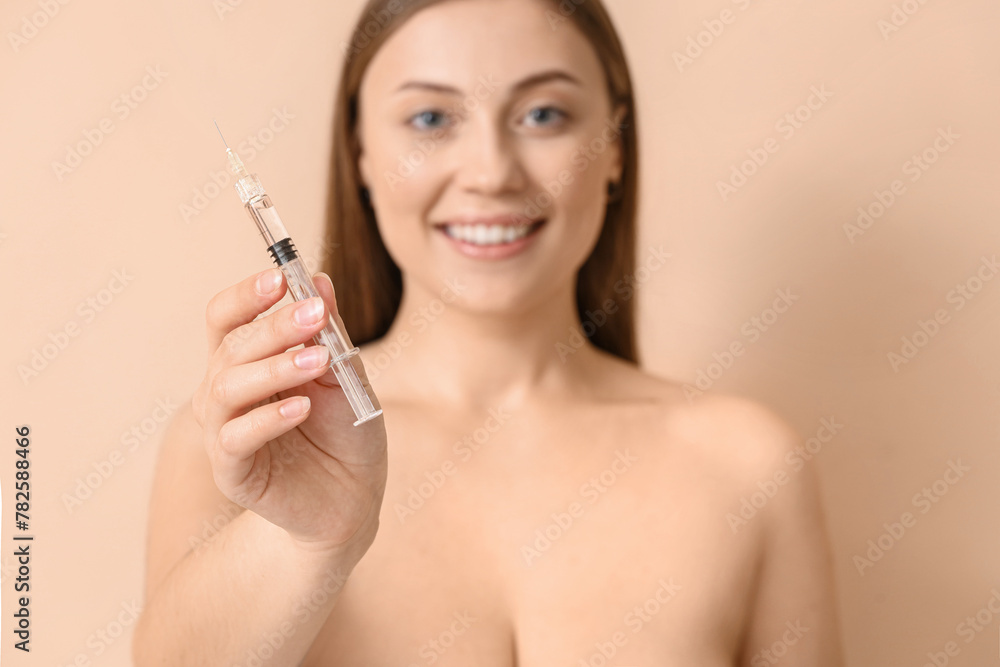 Beautiful woman with injection on beige background, closeup