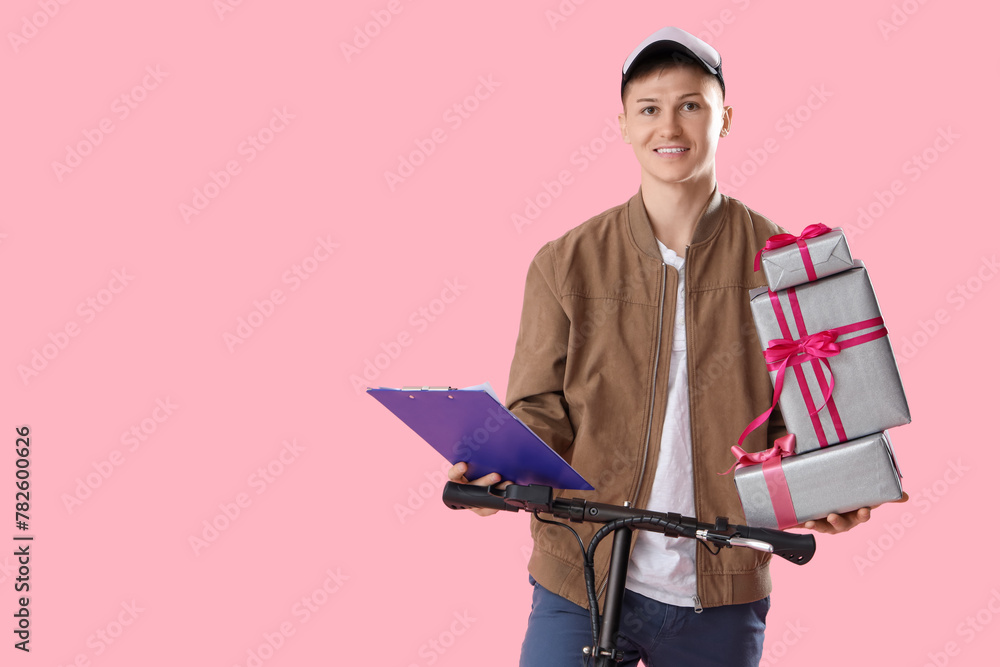 Male courier with gift boxes, clipboard and kick scooter on pink background