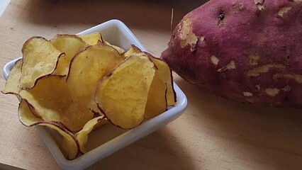 Wall Mural - A bowl of sweet potato chips.