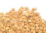 Fototapeta  - Dried peanuts in closeup on white