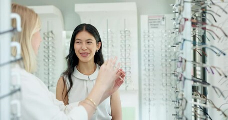 Canvas Print - Optometrist, glasses and person with choice of frame, prescription lens and spectacles for eyesight. Healthcare, medical service and optician help client in clinic for eye care, vision and wellness