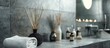 A white towel and a burning candle are placed on a counter in a well-lit bathroom creating a serene ambiance