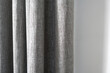 Close up of heavy thick gray curtain