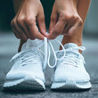 Witness the meticulous act of tying white shoelaces in this close-up image. AI generative technology adds realism to the runner's preparation.