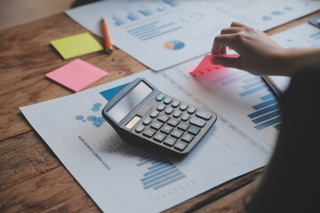 Co working conference, Business team meeting present, investor colleagues discussing new plan financial graph data on office table with laptop and digital tablet, Finance, accounting, investment.