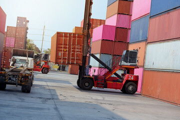 Wall Mural - Container. Industrial crane loading Containers in a Cargo freight ship. Container ship in import and export business logistic company. Industry and Transportation concept