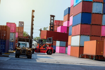 Wall Mural - Container. Industrial crane loading Containers in a Cargo freight ship. Container ship in import and export business logistic company. Industry and Transportation concept