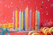 A playful array of oversized birthday candles in assorted colors, arranged amidst a backdrop of swirling streamers and cascading confetti, against a vibrant magenta background.