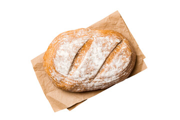 Freshly baked delicious french bread with napkin isolated on white background top view. Healthy white bread loaf