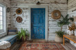 Bohemian blue coastal entrance door with a natural fiber rug and a ship-lap wall