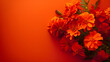a bouquet of bright orange marigolds against a deep orange backdrop