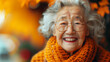 A asian woman with glasses, a yellow scarf is smiling. She looks happy and content. Concept of warmth and happiness. a fat old woman with 102 years old and a funny face and she is laughing in a photo