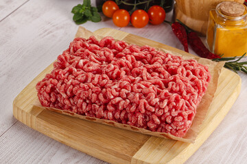 Poster - Raw minced beef meat over board