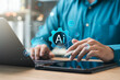 Businessman using artificial intelligence AI technology in future business, using artificial intelligence to make business more efficient, IoT, innovation and the future.