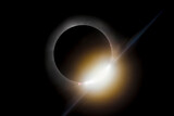 Fototapeta  - As the moon first reveals the sun at the end of totality, the second diamond ring formation appears briefly during the 2024 total solar eclipse.