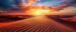 A vibrant sunset over a golden sand desert creating a stunning contrast of colors and textures