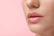 © New Africa - Woman wearing beautiful lip gloss on pink background, closeup. Space for text