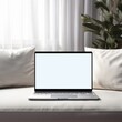 Open modern laptop with blank white screen on sofa in living room interior mockup. Empty laptop screen on table in modern room interior background, mockup