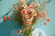 Surreal Portrait of Person Concealed by Vibrant Summer Flowers