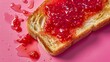 Canvas of toast, butter's silkiness complemented by the jewel-tone of strawberry jam