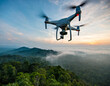 A contemporary drone soaring over a foggy rainforest at dusk