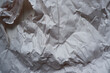 crumpled white paper texture background. 
crumpled paper material with shading.