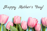 Fototapeta Na ścianę - Happy Mother's Day greeting card. Beautiful tulip flowers on light blue background