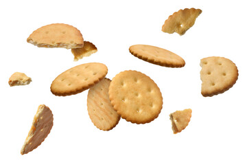 Wall Mural - Tasty dry crackers falling on white background