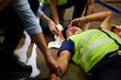 © offsuperphoto - senior worker fell over and his head is bleeding on the floor in the factory