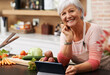 © peopleimages.com - Portrait, old woman and video of cooking and tablet in kitchen and watch for learning, meal prep and guide. House, senior and female person in home, healthy and food, salad and recipe, online or app