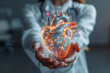 Female doctor holding virtual volumetric drawing of Heart in hand. Handrawn human organ, copy space on right side, grey hdr color. Healthcare hospital concept