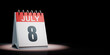July 8 Calendar Spotlighted on Black Background