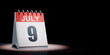 July 9 Calendar Spotlighted on Black Background