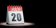 July 20 Calendar Spotlighted on Black Background