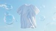 Washed white t-shirt on blue sky background
