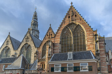 the oude kerk in the red-light district of amsterdam