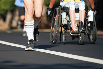 Wall Mural - Marathon running race, people feet on city road